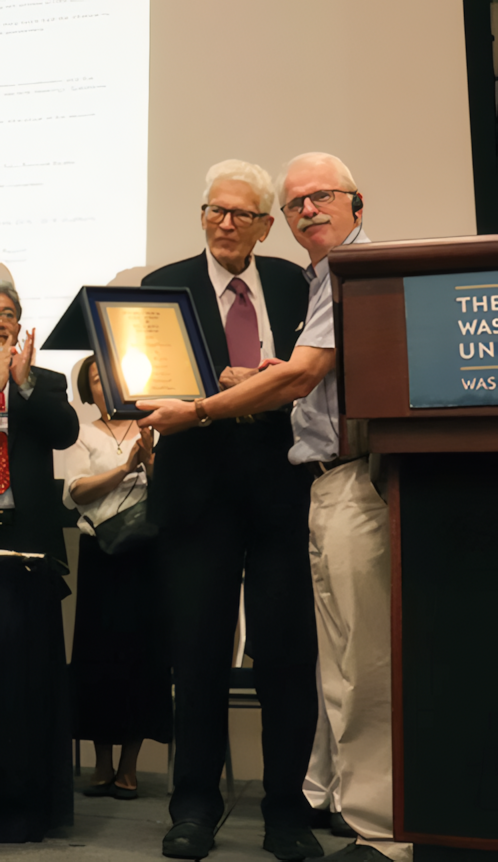 Rev. Boeke receiving the IARF Distinguished Leadership Award