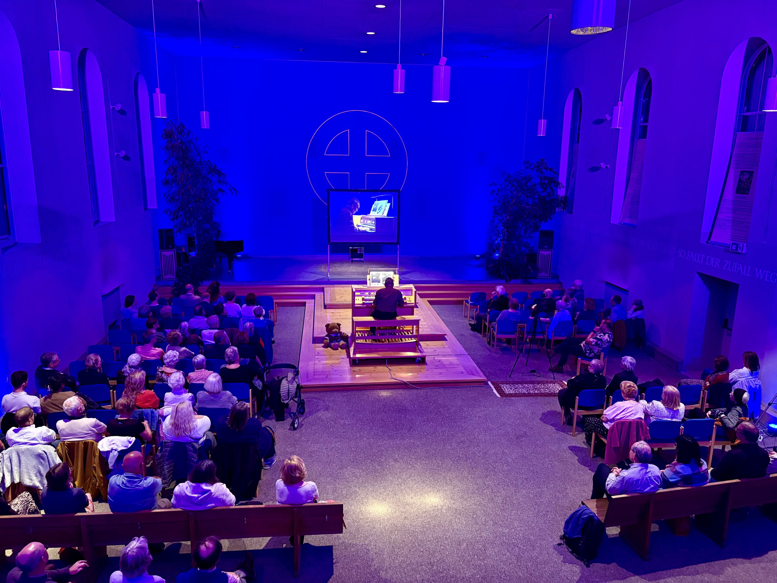 The audience applauding after a presentation.
