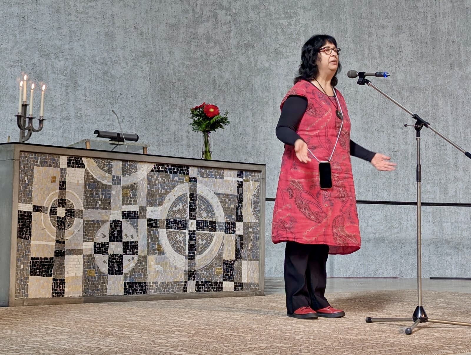 Rev. Dr. Esther Suter speaking.