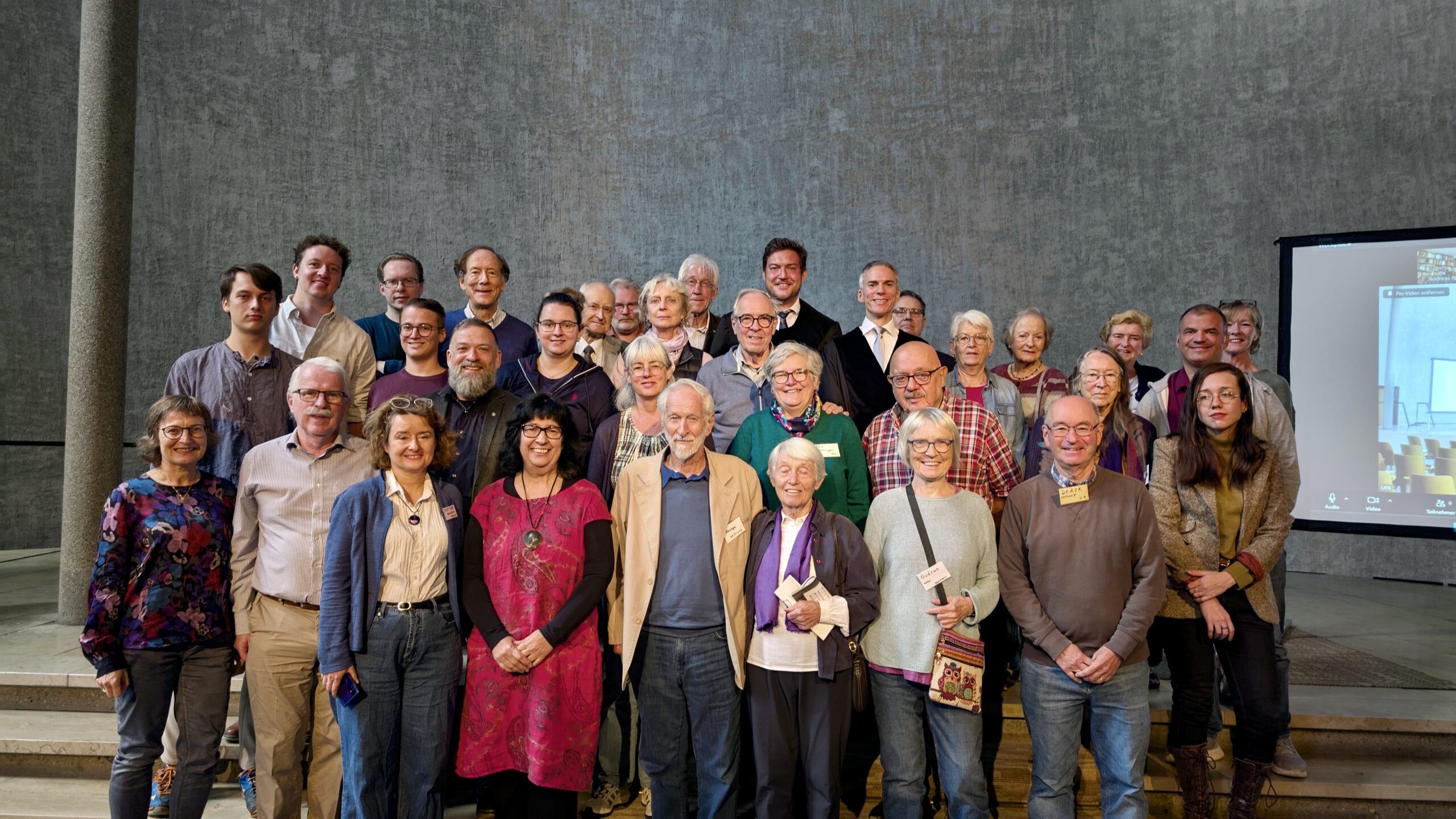 A smiling participant at the conference closing.