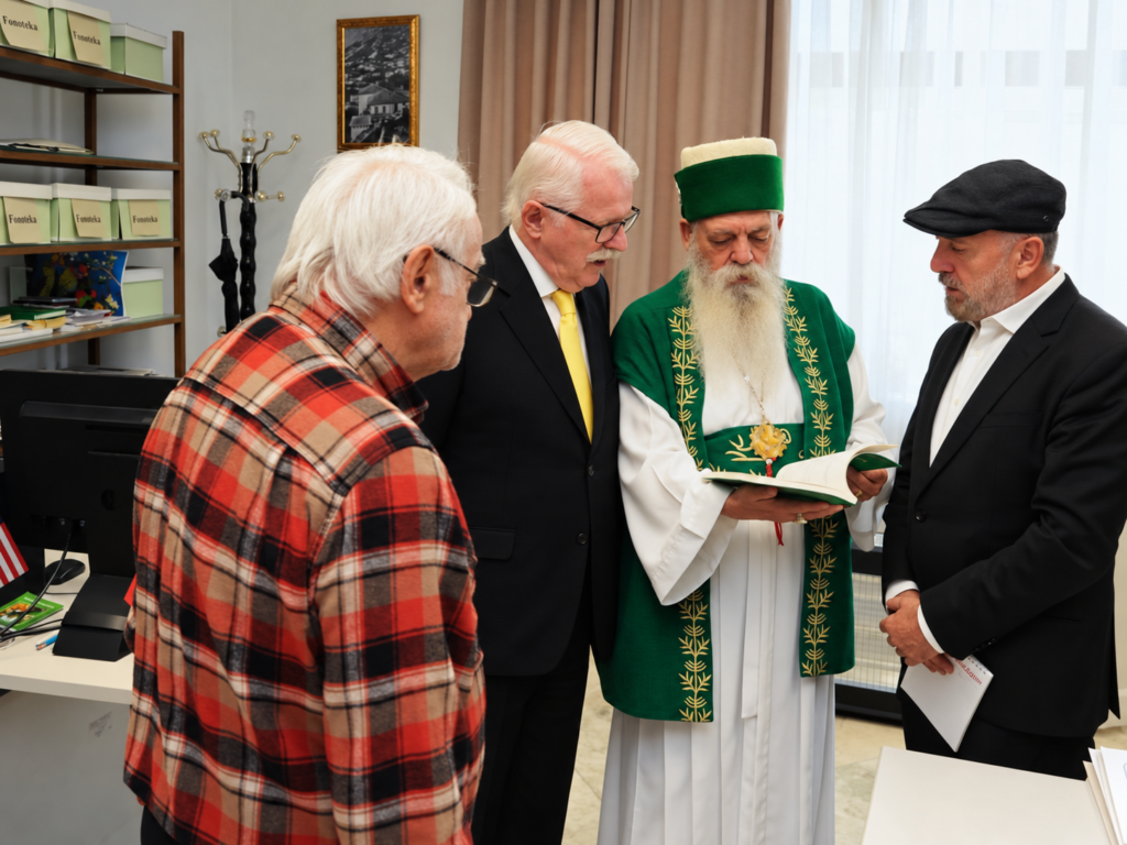 Robert Ince and other visitors look at an open book held by Baba Mondi.