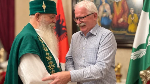 Robert Ince and Dedebaba Edmond Brahimaj smile as they greet each other at the Bektashi World Headquarters in Tirana.